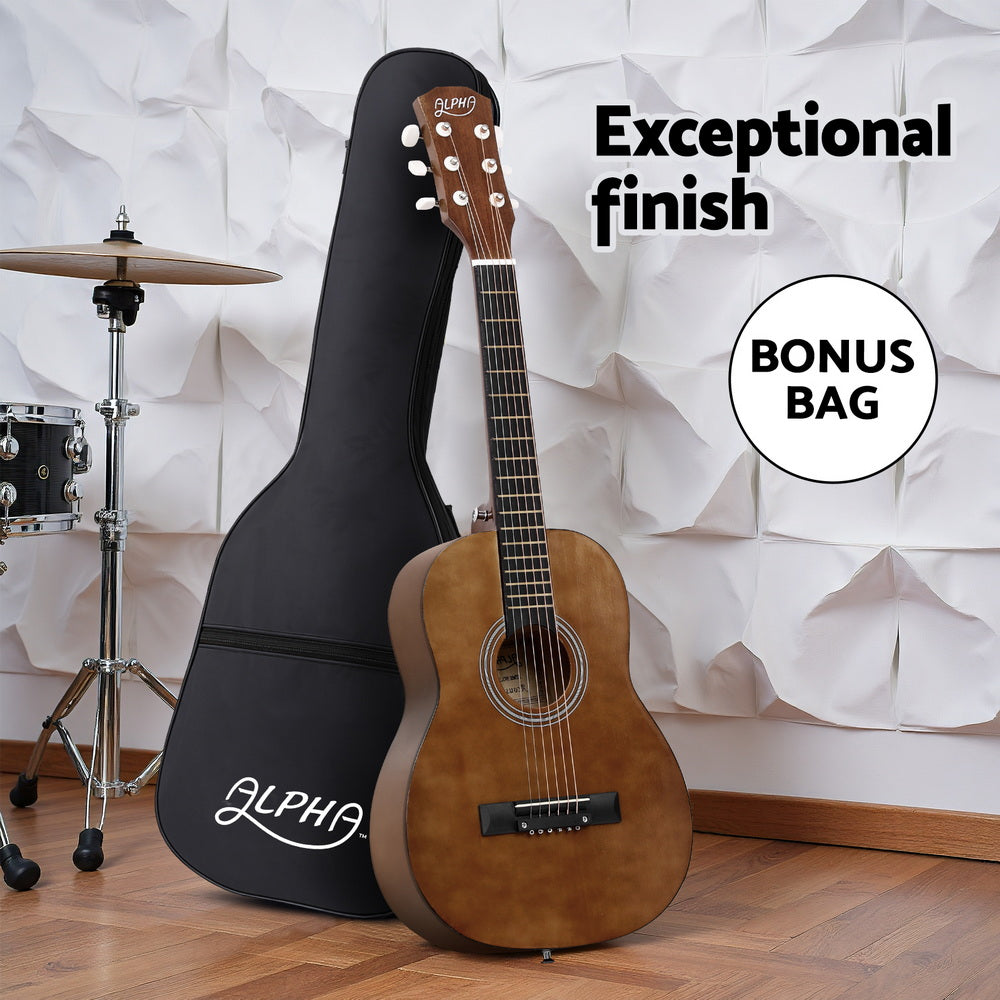 Acoustic guitar with black case and 'Alpha' branding, set against a white textured wall.