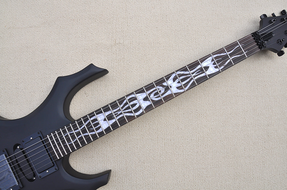 Black electric guitar with white pattern on the fretboard against a beige background for sale in melbourne