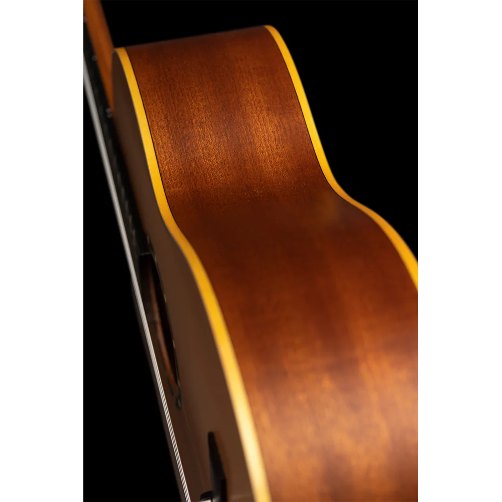 Front body close-up of left-handed classical guitar showing solid cedar top and walnut bridge, Sydney guitars
