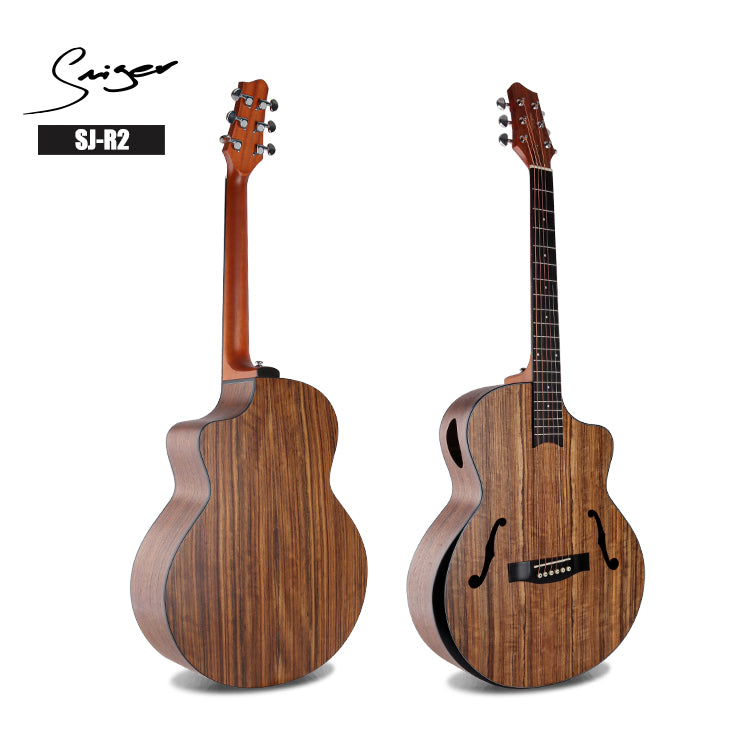 Two wooden guitars on a white background with 'Suhr' branding.